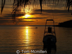Sunset on the westend Island of Roatan, at a little bar c... by Tom Mcmillen 